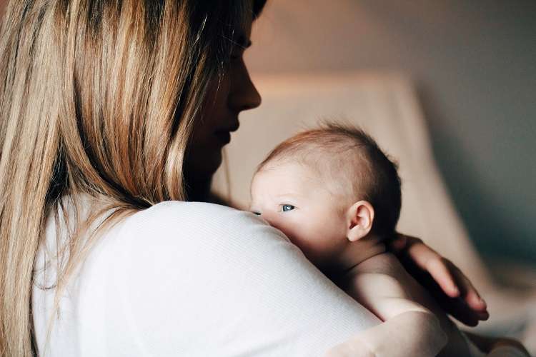 163 pregnancy chiropractic treatment carrying a newborn